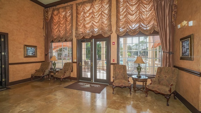 4134 Central Sarasota Pkwy Unit 1734, Sarasota, FL 34238 - doorway featuring a towering ceiling and baseboards