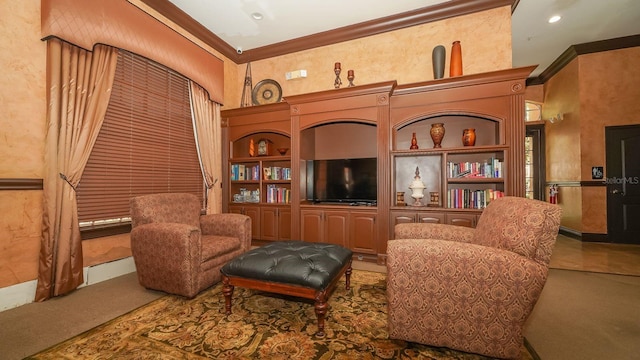 living area with crown molding