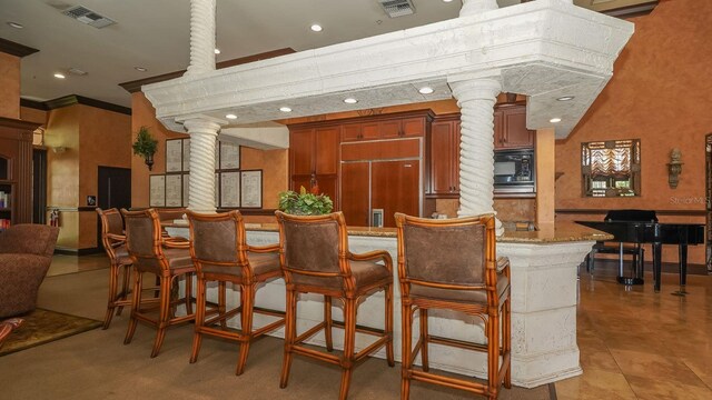 4134 Central Sarasota Pkwy Unit 1734, Sarasota, FL 34238 - dining area with decorative columns, recessed lighting, and ornamental molding