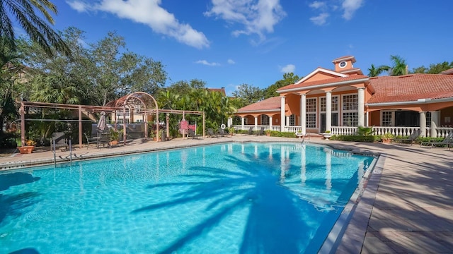 view of pool featuring a patio area