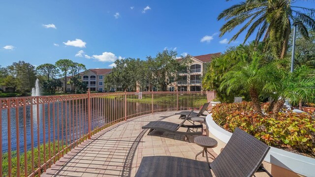4134 Central Sarasota Pkwy Unit 1734, Sarasota, FL 34238 - view of patio with a water view