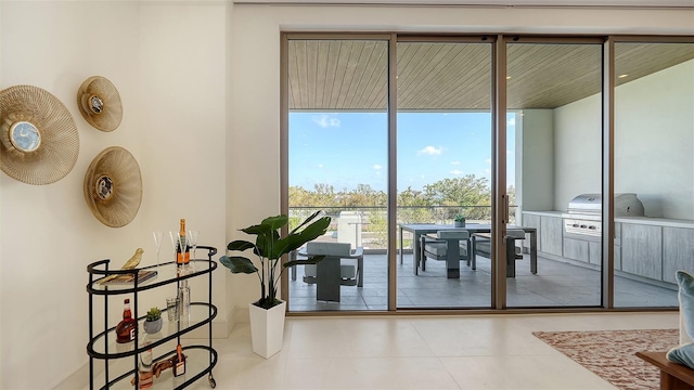 doorway with expansive windows