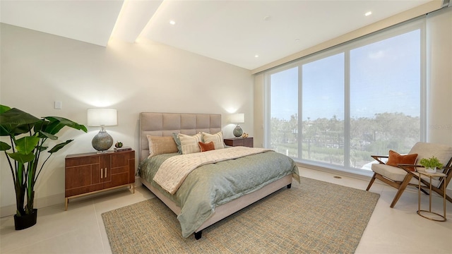 bedroom with light tile patterned flooring