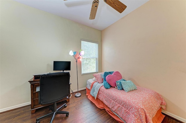 bedroom featuring ceiling fan and dark wood-type flooring