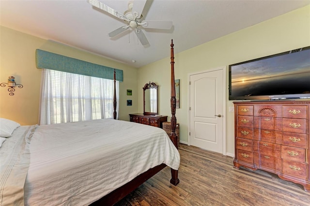 bedroom featuring hardwood / wood-style flooring and ceiling fan