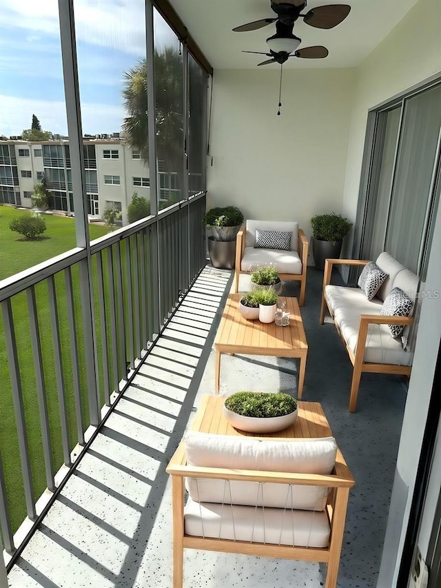 balcony with ceiling fan and an outdoor living space