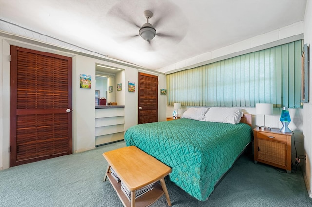 carpeted bedroom featuring ceiling fan