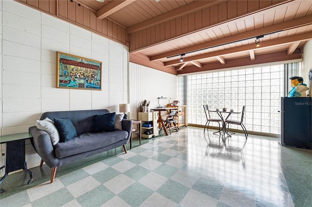 interior space with wooden ceiling and beamed ceiling