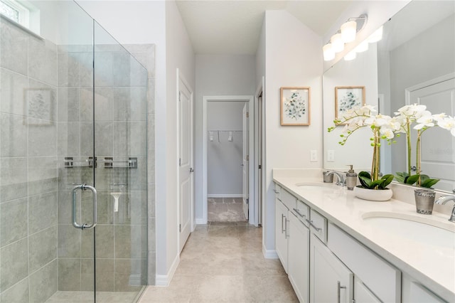 bathroom featuring vanity and walk in shower