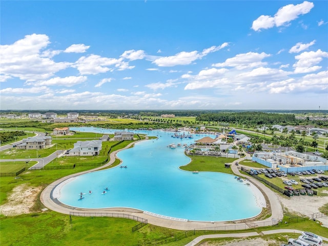 birds eye view of property featuring a water view