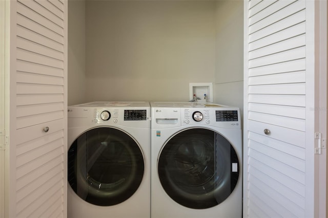 laundry room featuring washer and dryer