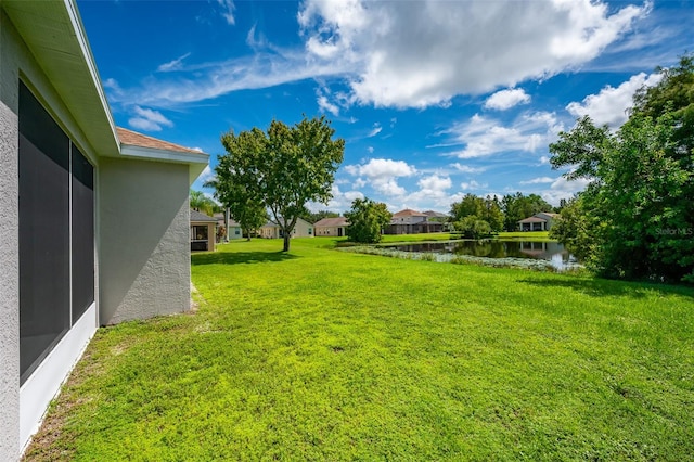 view of yard featuring a water view