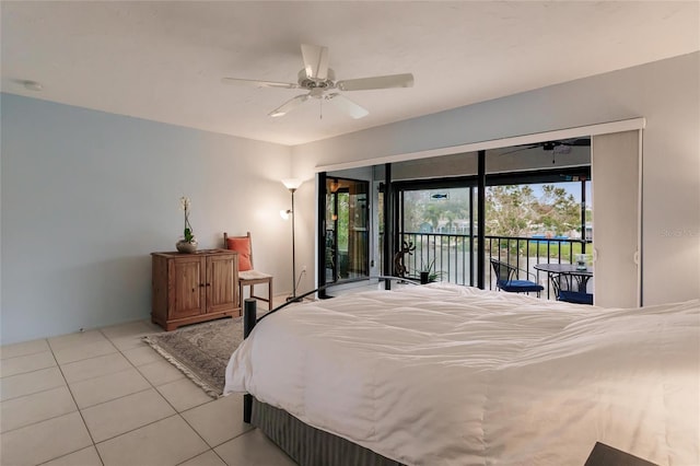 bedroom featuring access to exterior, ceiling fan, and light tile patterned flooring