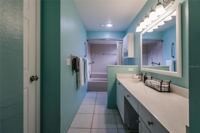 bathroom with vanity, shower / bath combo with shower curtain, and tile patterned flooring