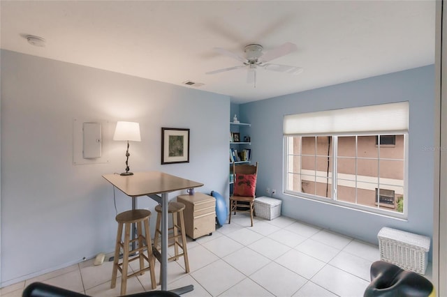 tiled home office with ceiling fan