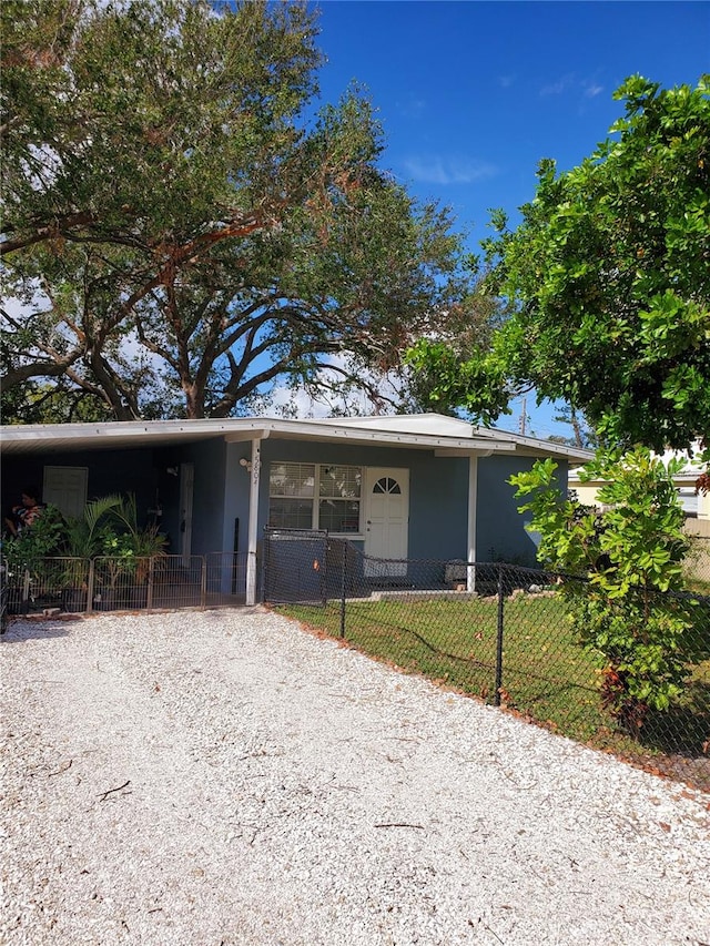 view of front of house featuring a carport