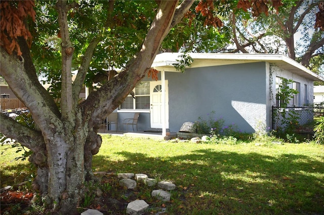 exterior space with a lawn