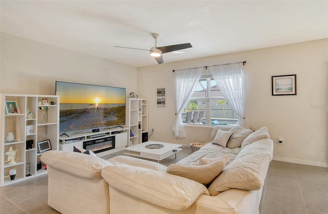 living room with light tile patterned flooring and ceiling fan