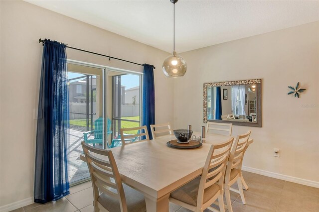 dining room with light tile patterned floors