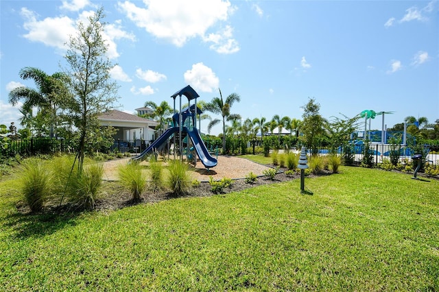 view of playground with a yard