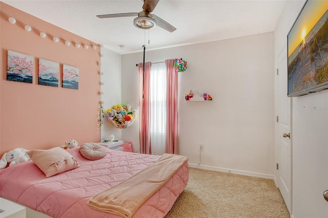 bedroom with light colored carpet and ceiling fan