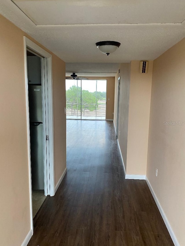 hall featuring dark wood-type flooring