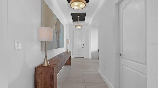 hall with light tile patterned flooring