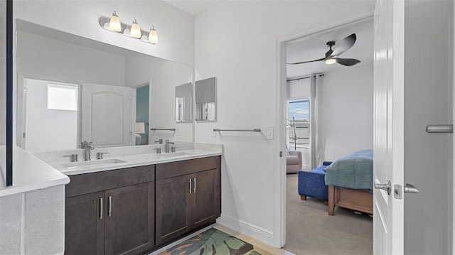 bathroom featuring vanity and ceiling fan