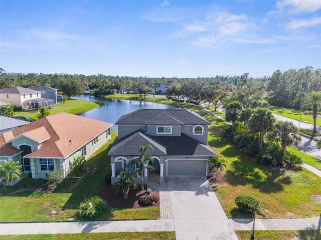 aerial view with a residential view and a water view