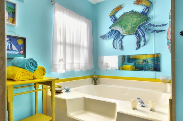 bathroom featuring a washtub