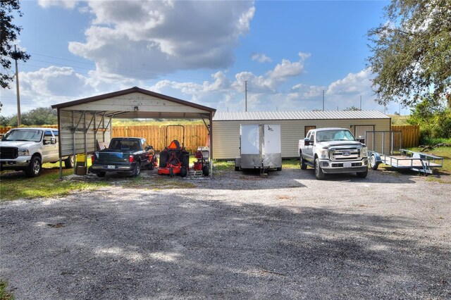 exterior space featuring a carport