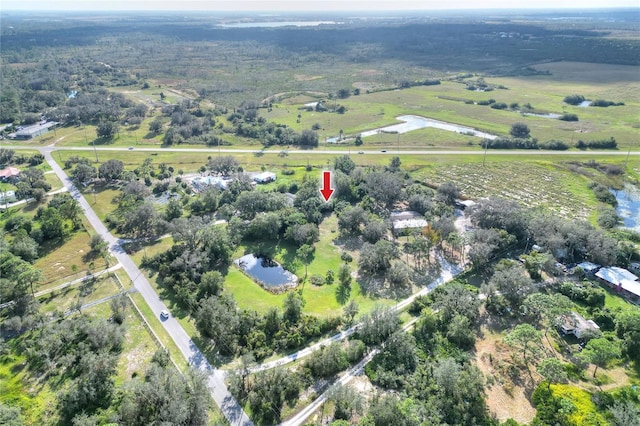 birds eye view of property featuring a rural view