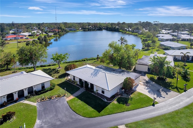 drone / aerial view with a water view