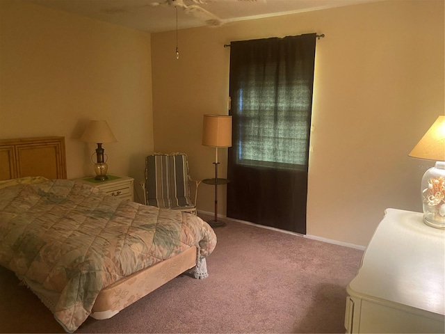 bedroom with ceiling fan and carpet