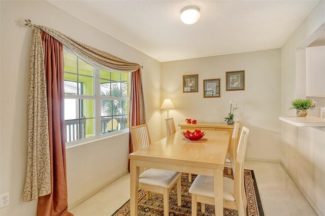 dining room with carpet flooring