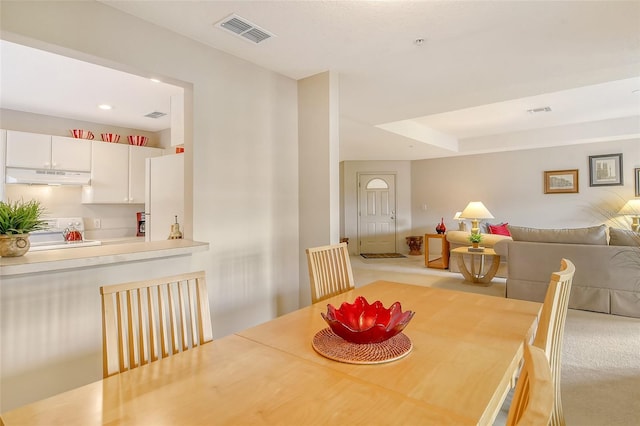381 Bobby Jones Rd Unit 381, Sarasota, FL 34232 - dining area with carpet flooring and recessed lighting