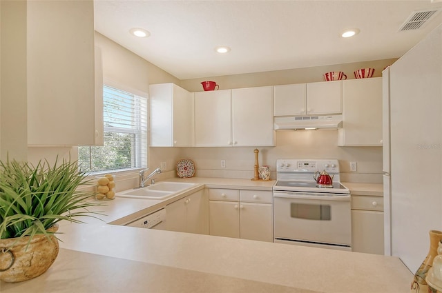 kitchen featuring white cabinets, white appliances, and sink