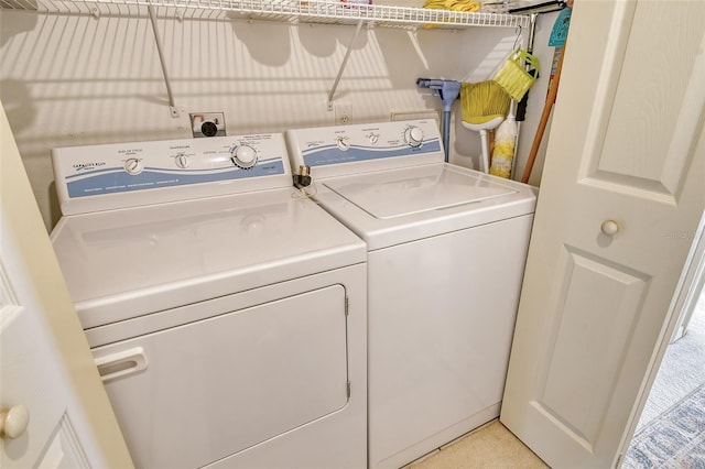 washroom with separate washer and dryer