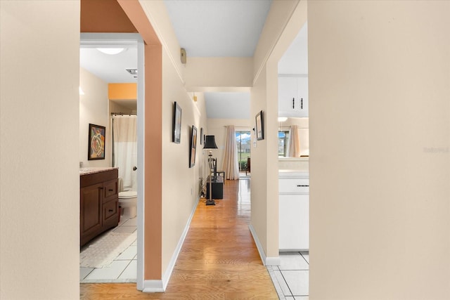 hallway featuring light wood-type flooring