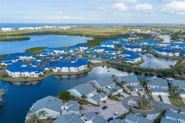 drone / aerial view featuring a water view