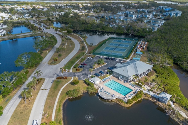 birds eye view of property featuring a water view