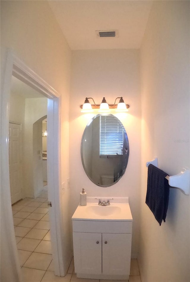 bathroom featuring vanity and tile patterned floors