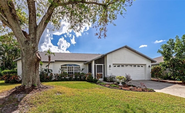 ranch-style house with a front lawn and a garage