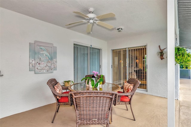 view of patio with ceiling fan