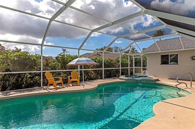 view of swimming pool featuring a lanai, a patio area, and an in ground hot tub