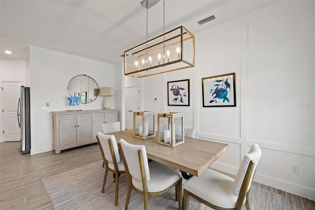 dining room featuring light hardwood / wood-style flooring