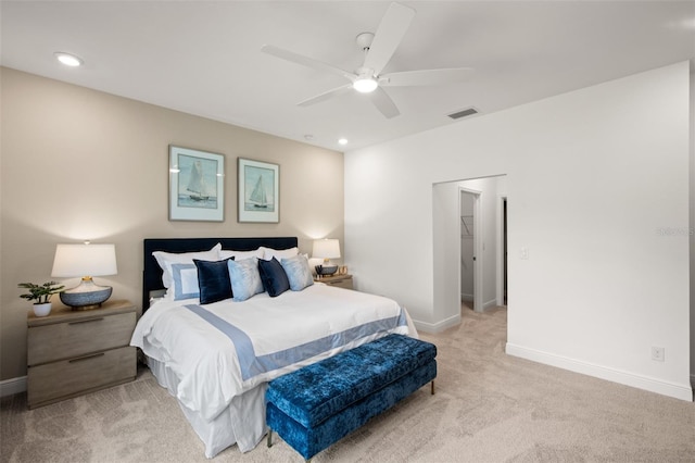 carpeted bedroom featuring ceiling fan