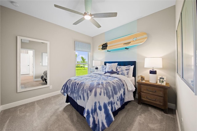 bedroom featuring ceiling fan and carpet