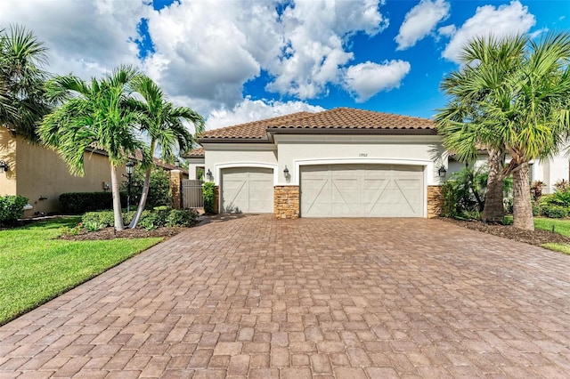 mediterranean / spanish-style home featuring a garage