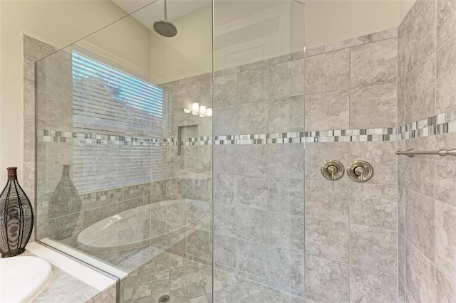 bathroom featuring plus walk in shower